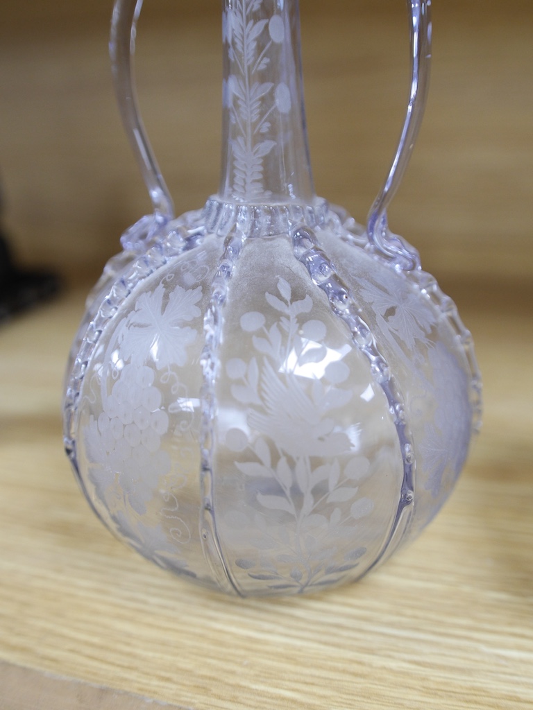 A pair of 18th century wheel engraved Dutch two handled glass decanters, 23cm high. Condition - good